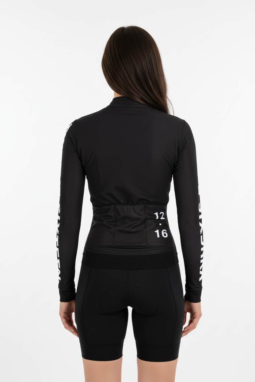 Women wearing a black Long Jersey ot with text on sleeves 